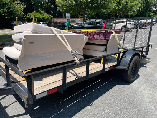 TexMex Furniture and Detailing Co Truck and Trailer Removing a White Sectional and Twin Bed