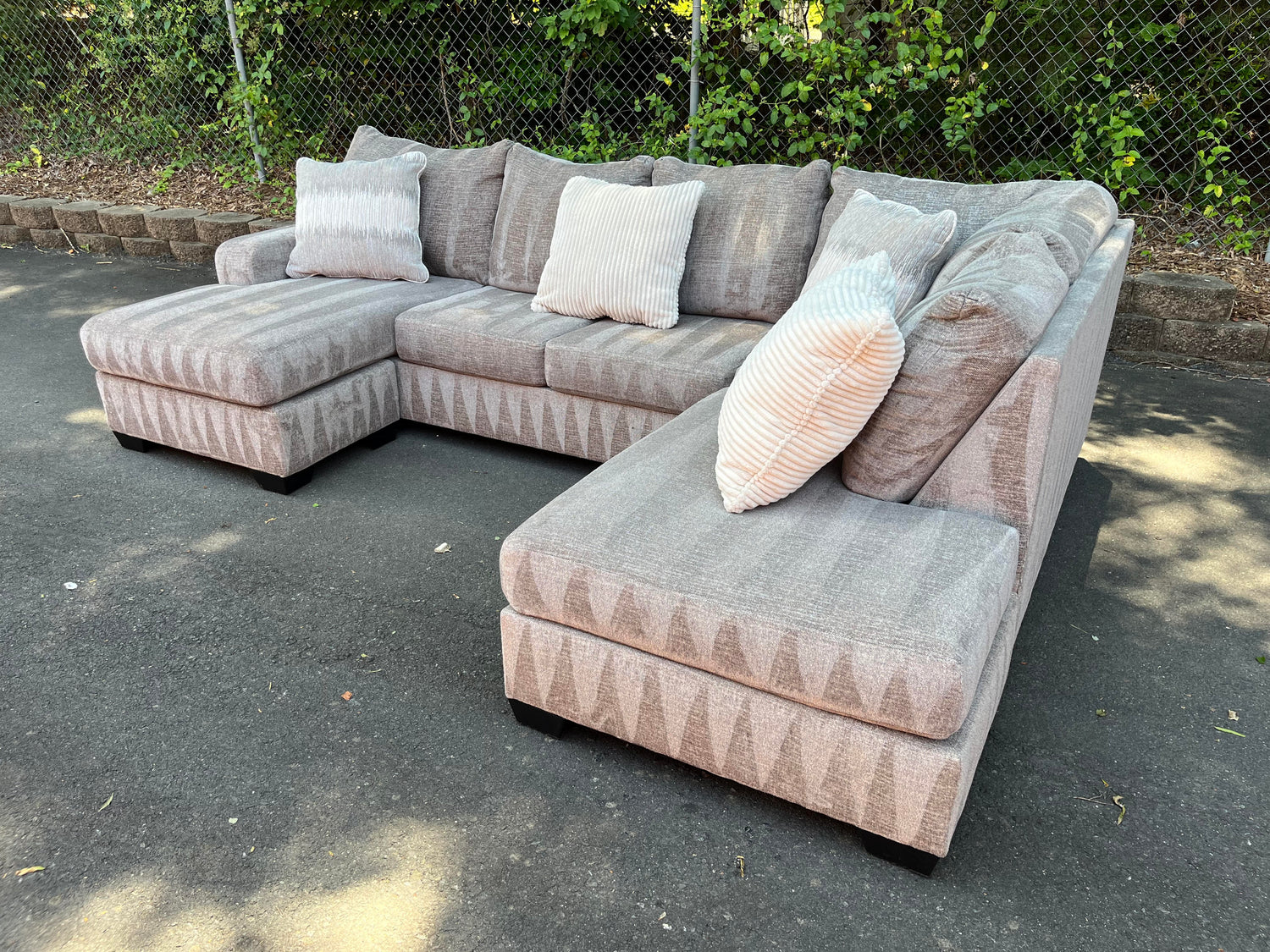 3 Piece Dual Chaise Ashley Furniture Store Beige Sectional with Throw Pillows Front Above Right Hand Chaise View